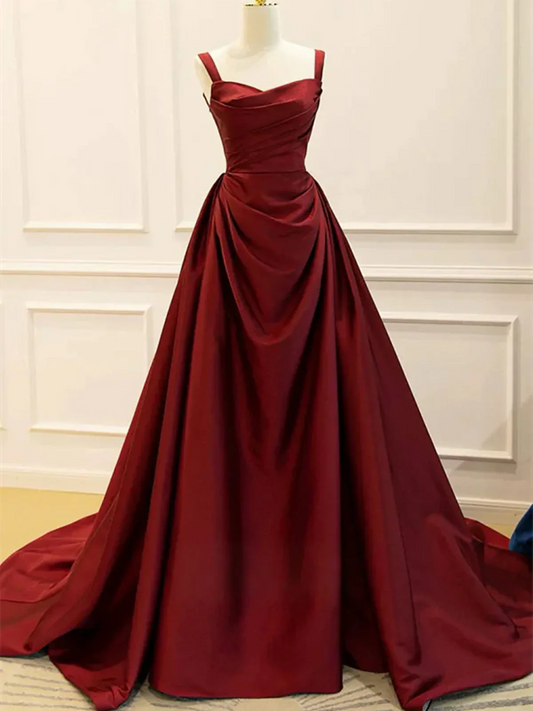 Back view of a regal satin ball gown prom dress with a lace-up corset back.