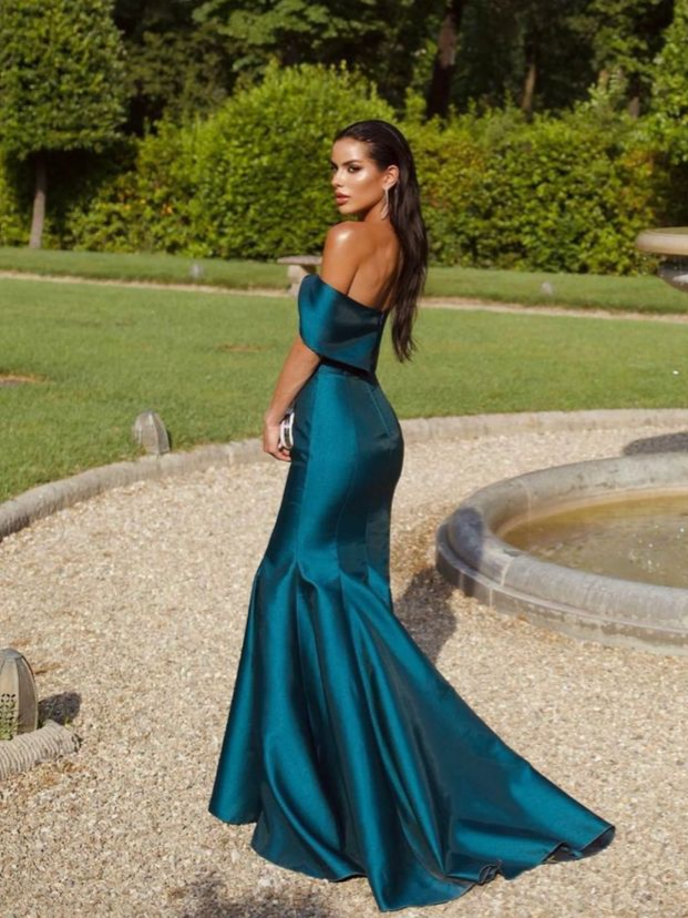 Full view of the teal satin mermaid prom dress, featuring a flared hem and elegant silhouette.