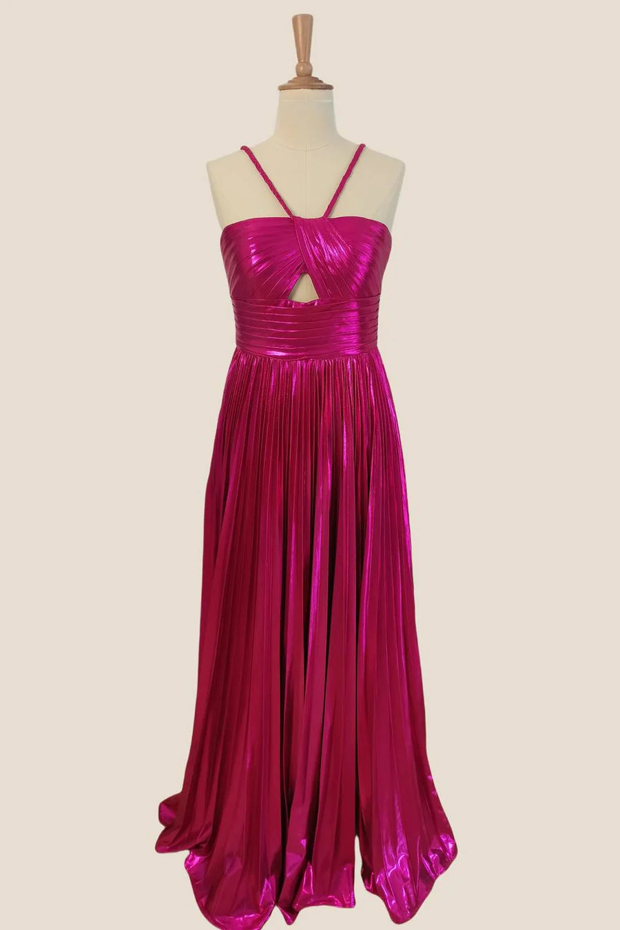 Front view of shimmering metallic halter keyhole gown.