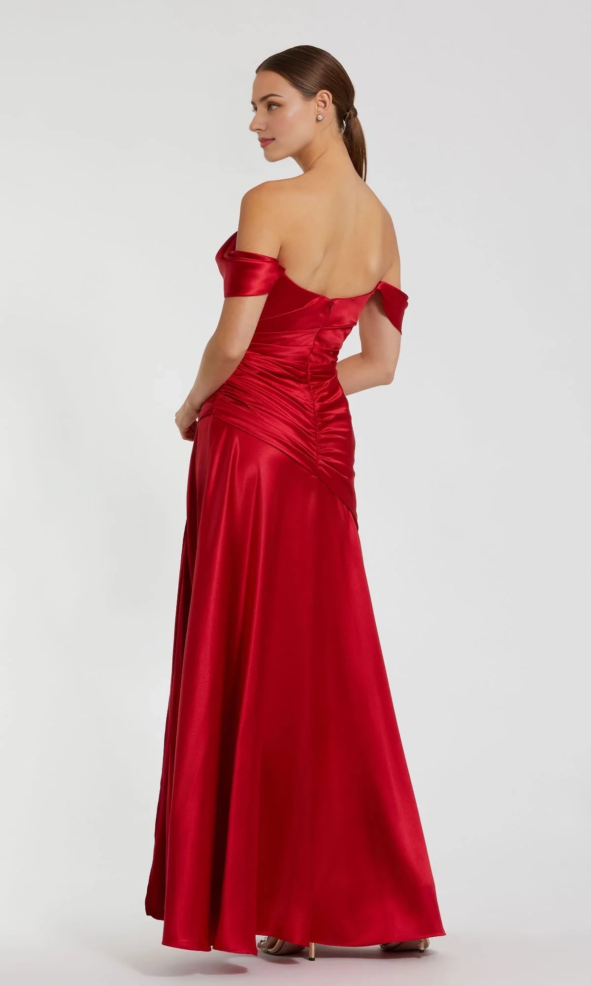 Shoulder less neckline with sleeveless pleats, backless side slit and floor length Prom dress