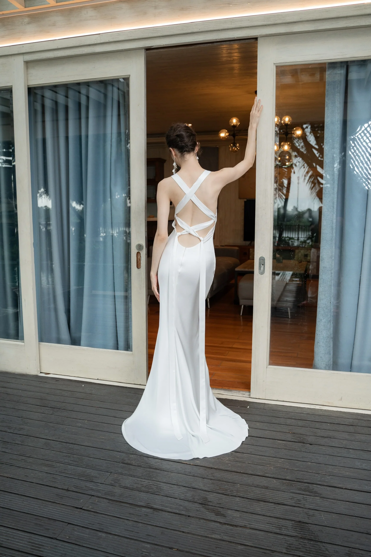 Sleek satin V-neck sleeveless crisscross-back mermaid floor-length evening dress