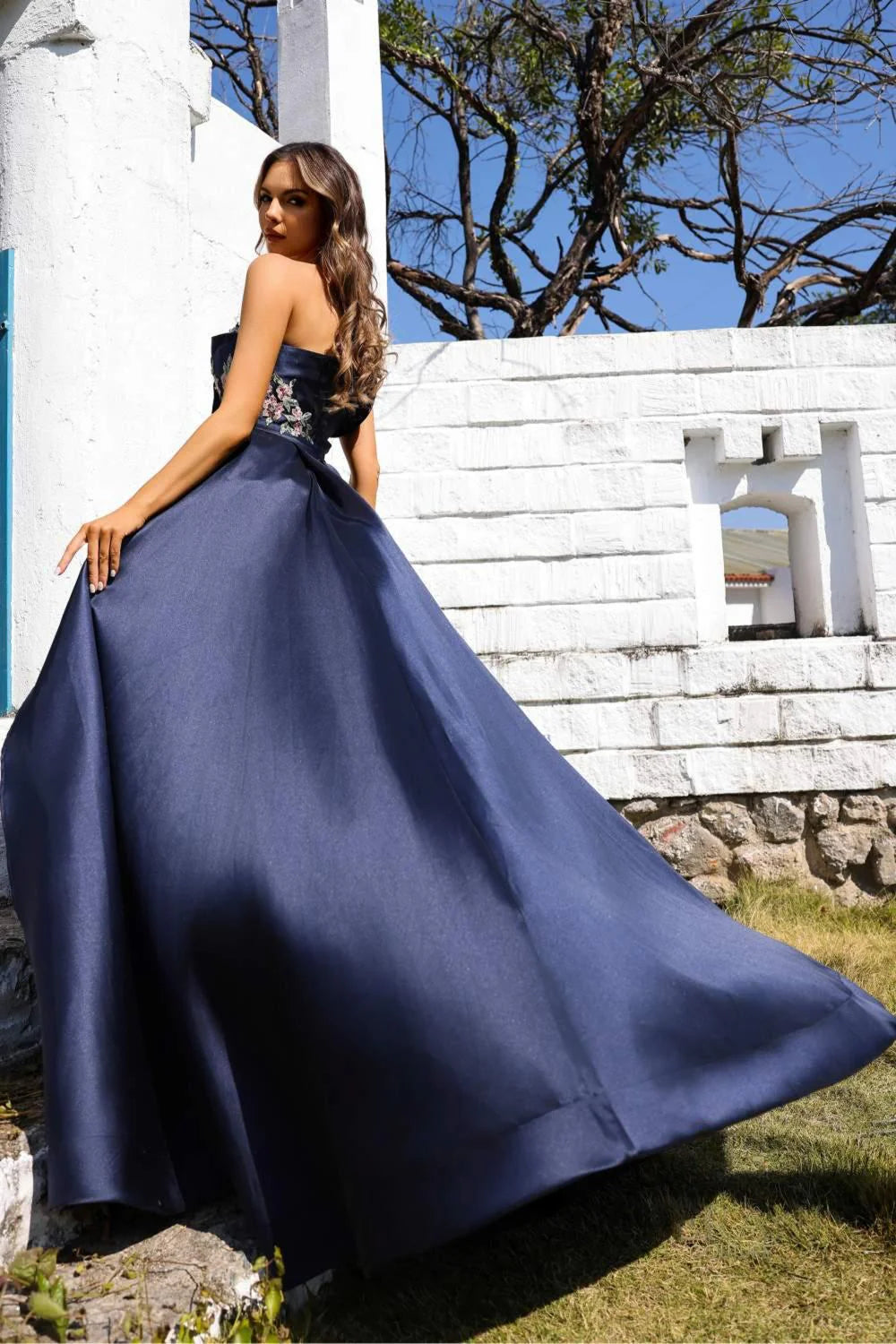 Striking Evening Dress with Off-the-Shoulder Neckline, Floral Embroidery and Overskirt