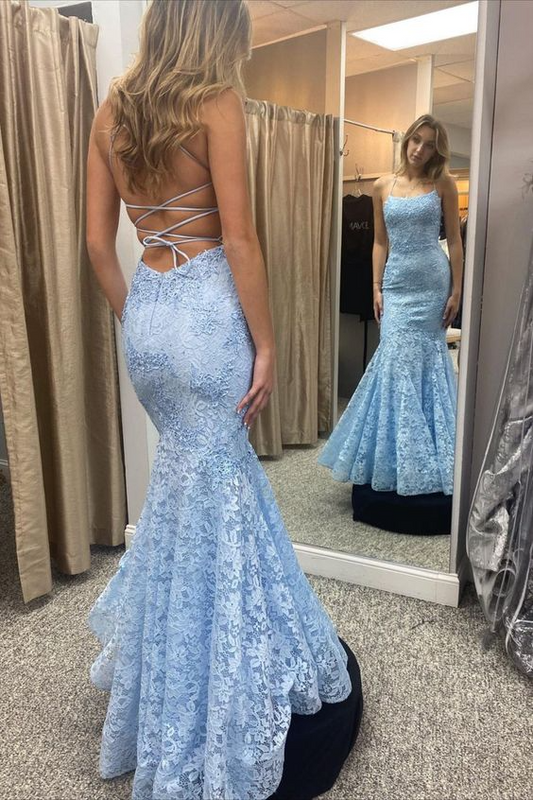 Stunning lace mermaid prom gown with square neck, spaghetti straps, and lace-up back.