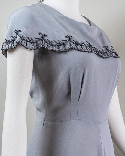 Vintage-Inspired Satin Evening Dress with Beaded Capelet Collar and Flowing Skirt