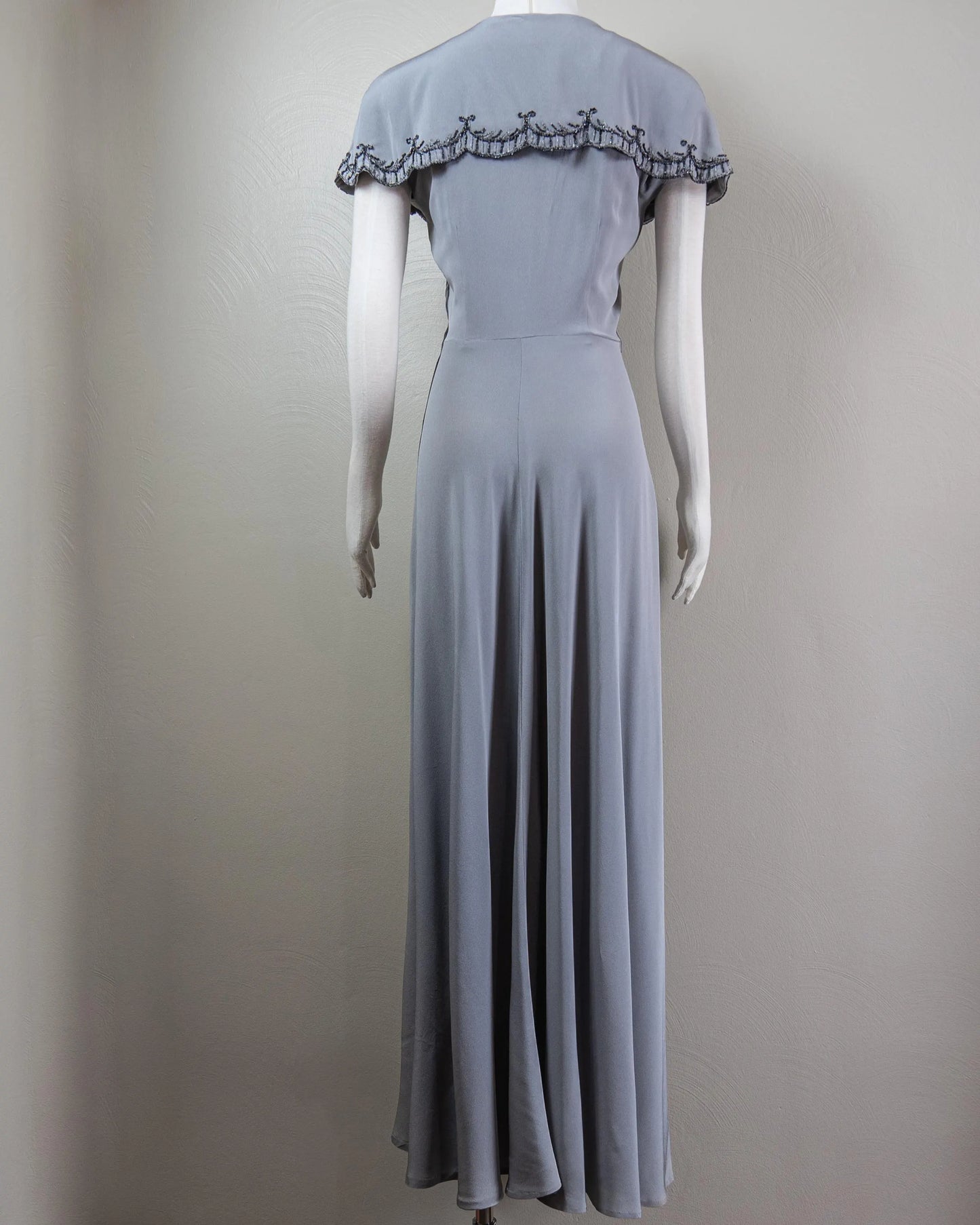 Vintage-Inspired Satin Evening Dress with Beaded Capelet Collar and Flowing Skirt