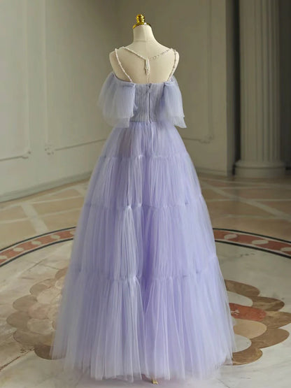 Voluminous tiered tulle ball gown spaghetti-strap off-the-shoulder floor-length prom dress