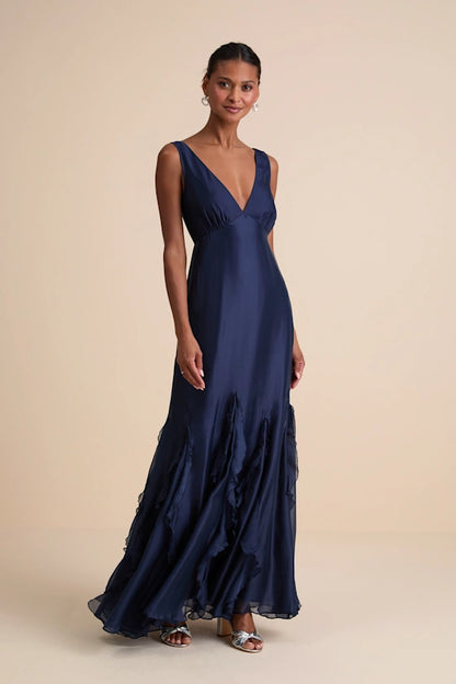 Whimsical Chiffon Evening Dresses with V-Neckline, Deep V-Back Detail, Dramatic Ruffle Mermaid Skirt and Flowing Silhouette Formal Gown