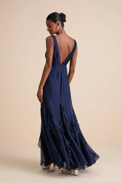 Whimsical Chiffon Evening Dresses with V-Neckline, Deep V-Back Detail, Dramatic Ruffle Mermaid Skirt and Flowing Silhouette Formal Gown