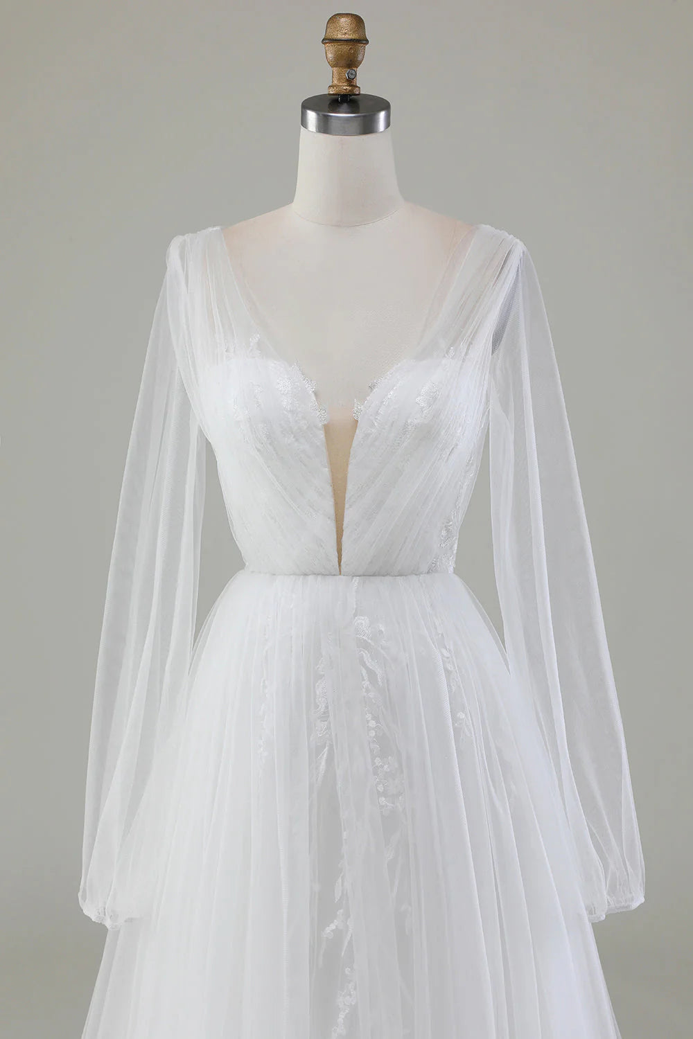 Ivory A-line V-neck long sleeved pleated sheer wedding dress