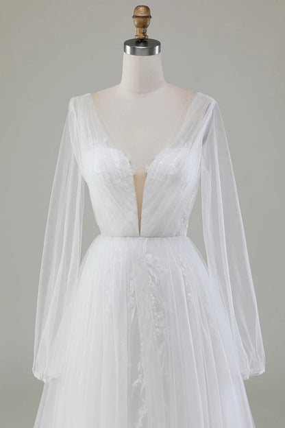 Ivory A-line V-neck long sleeved pleated sheer wedding dress