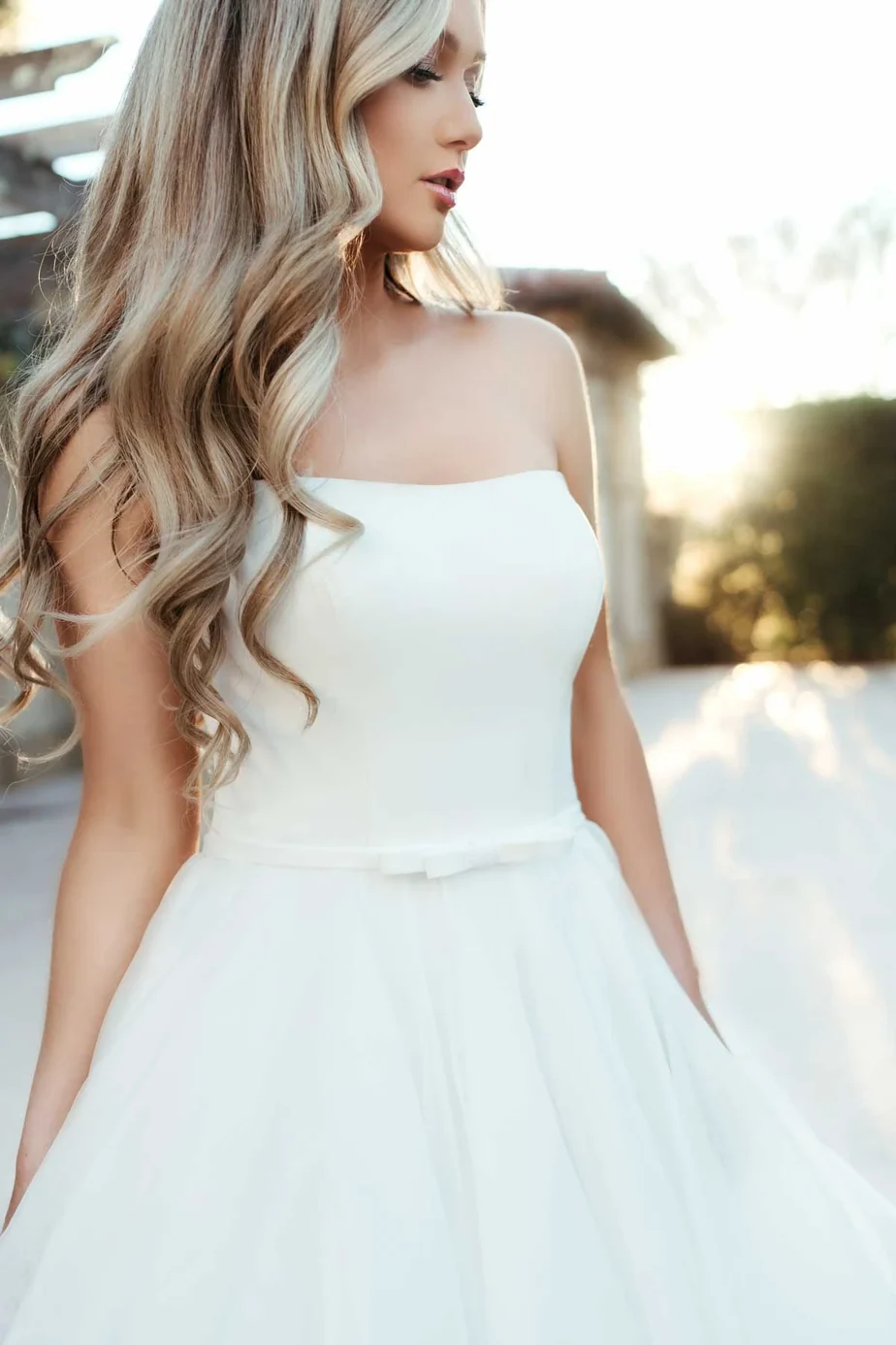 strapless a line organza bow sash button back wedding dress