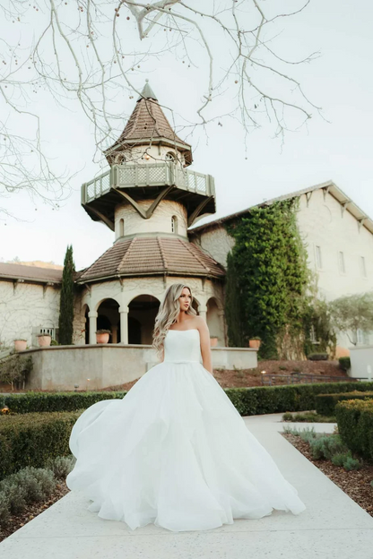 strapless a line organza bow sash button back wedding dress