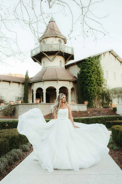 strapless a line organza bow sash button back wedding dress