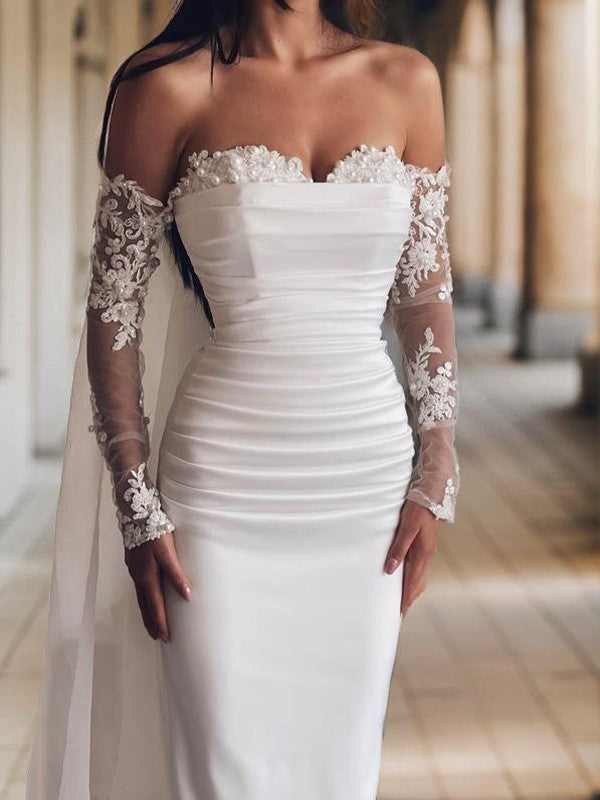 Tight off shoulder sweetheart beaded and ground length satin backless wedding dress