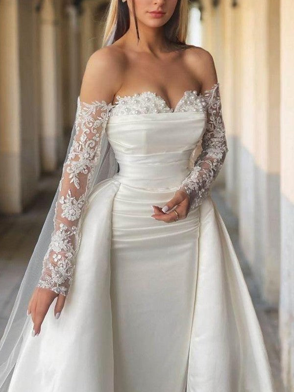 Tight off shoulder sweetheart beaded and ground length satin backless wedding dress