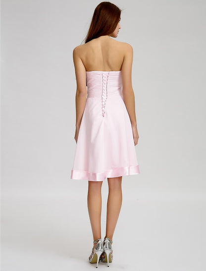 A-Line Strapless Knee Length Chiffon Bridesmaid Dress with Bow(s) / Criss Cross