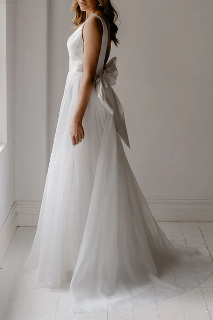 A-shaped deep V-neck ivory minimalist Bohemian style wedding dress with backless bride dress