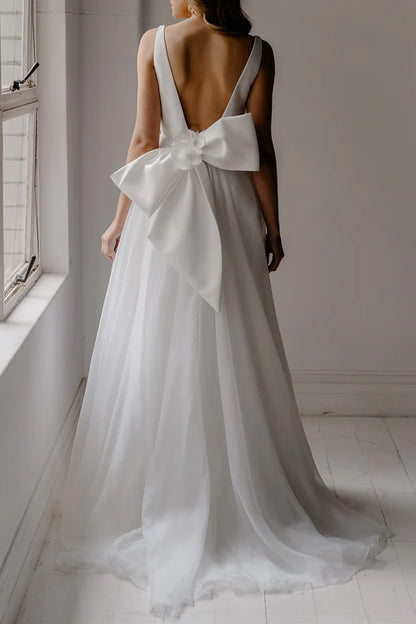 A-shaped deep V-neck ivory minimalist Bohemian style wedding dress with backless bride dress